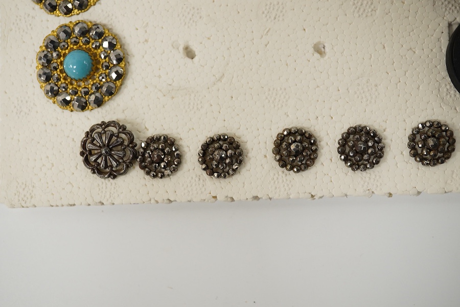 Five assorted sets of late 19th / early 20th century buttons;, Condition - the small cut steel buttons are tarnished